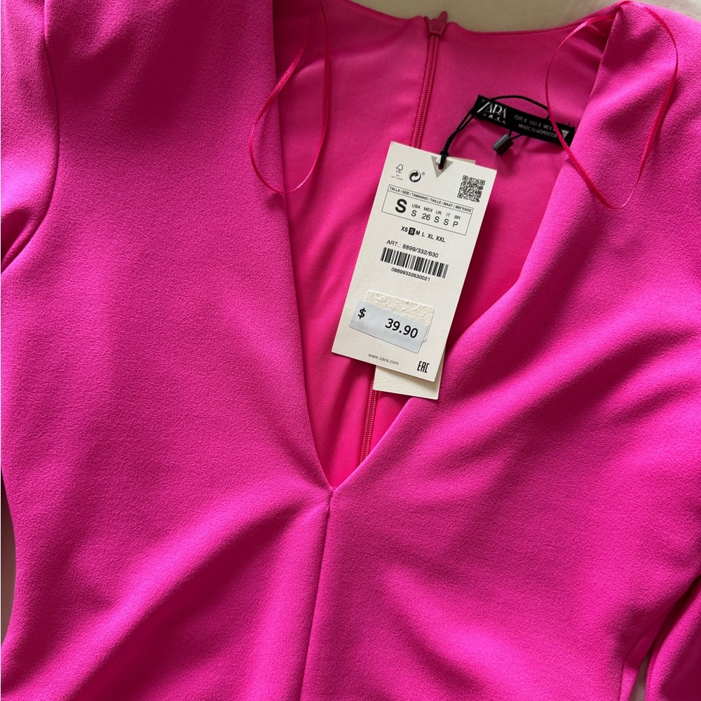 hot pink body suit, zipper back, snap closure in crotch (2 adjustments)